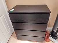 Front view showing four drawers and color