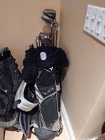 Overall view of Dunlop golf bag with clubs and headcovers
