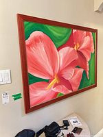 Framed acrylic painting on wall showing full view