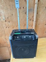 Full view of Ion Block Rocker speaker front with telescoping handle extended