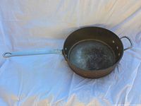 Top view of skillet showing interior patina and both handles