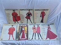 Front covers of all seven Town & Country magazines displayed on white backdrop