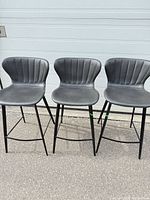 Front view of all three gray bar stools