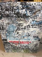 Front view showing abstract design and "TEATRO BASTIÓN" text