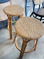 Two natural rattan bar stools overall view