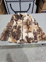Full view of patchwork fur coat front