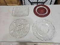 Group shot of all four glass pieces on table