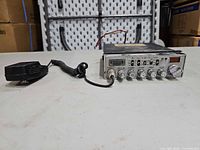 Front view of Cobra 29 NW LTD Classic CB radio with attached microphone