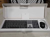 Keyboard and mouse set inside original box