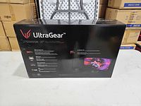 Rear of LG UltraGear 27GS600QN retail box showing product image and specifications.