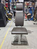 Front view of Technogym abdominal crunch machine