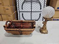 Basket and lamp side by side showing overall forms