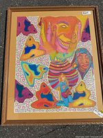 Full view of framed artwork showing entire composition and frame