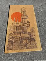 Full view of burlap screen print showing house and orange sun