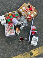 Overview of entire mixed Christmas lot laid out on ground