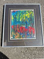 Front view of framed abstract painting