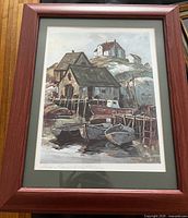 Full view of framed Peggy's Cove print with mat and wooden frame
