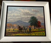Full view of framed painting showing scene and framing