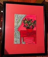 Framed painting with red mat and black frame
