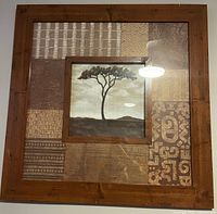 Full view of square framed collage print showing central tree image and patterned panels