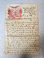 Full view of folded letter front with patriotic letterhead and visible losses