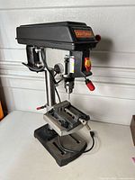 Full view of Craftsman benchtop drill press with vise mounted