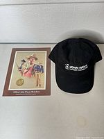 Hat and card with medallion overview