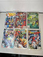 Group shot of all six bagged Marvel comic books