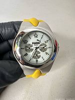 Front view showing dial, bezel, strap color