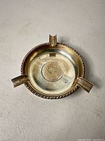 Top view showing ashtray shape, beaded rim and three rests