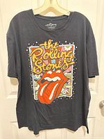 Front view of black Rolling Stones T-shirt showing full graphic