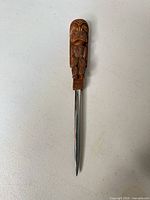 Full view of tiki handle letter opener