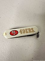 Closed knife showing 49ers logo side