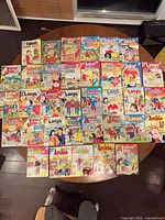 Front covers of all digest comics spread on table