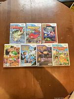 Seven game cases arranged showing cover art