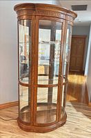 Full view of curved glass cabinet front
