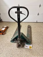 Full view showing handle, forks, and branding