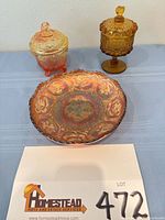 Group shot showing marigold bowl and two covered candy dishes
