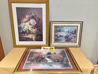 All three framed prints grouped on table