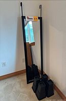 mirror and bed risers overall view