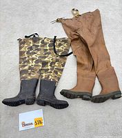 Both pairs of waders side by side