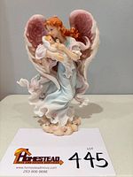 Front view of angel figurine showing full detail