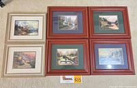 Group shot of all six framed Thomas Kinkade prints on floor