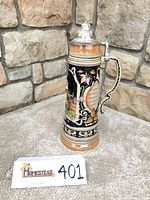 Full view of stein front with inscription and handle