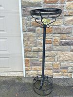 Full view of wrought iron plant stand front