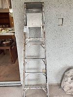 Front view showing full height and five steps