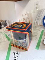 Jug in original box with surrounding glassware