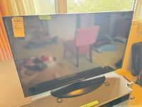 Front view of Samsung 40" TV on stand