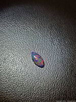 Top view of marquise opal showing play-of-colour