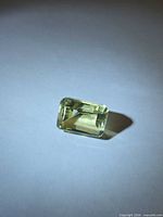 Rectangular lemon citrine face-up showing step facets